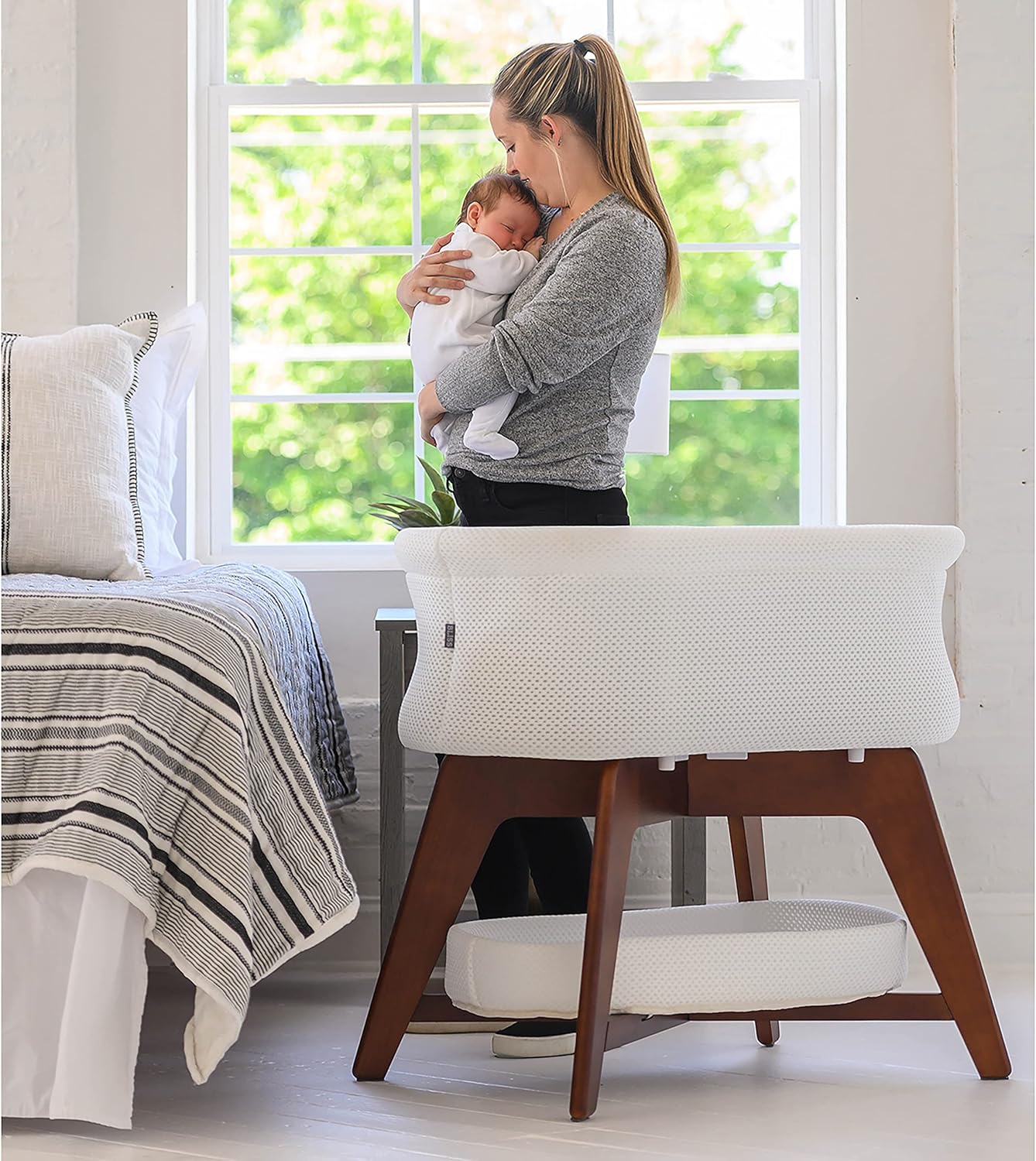 Evi Smart Baby Bassinet Beside Sleeper with Auto-Glide, Ambient Nightlight & Sensory Sounds, Compatible with Alexa and Google Home, Includes 2 Sheets (Soft White W/Natural Legs)